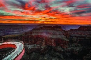 a red and orange sky above a canyon-Grand Canyon